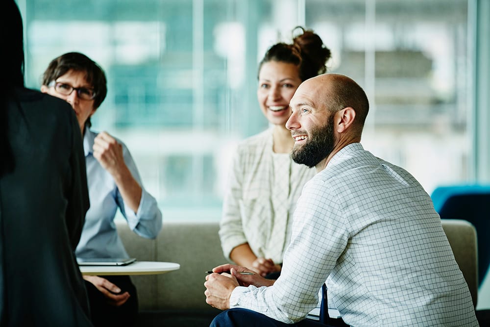 Businessman in discussion with colleagues